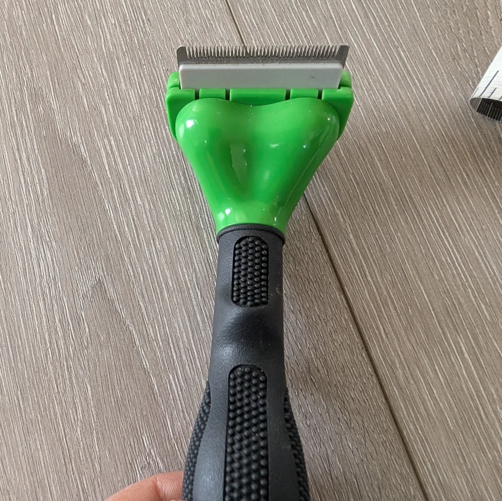 FURminator Black and Green Grooming Tool